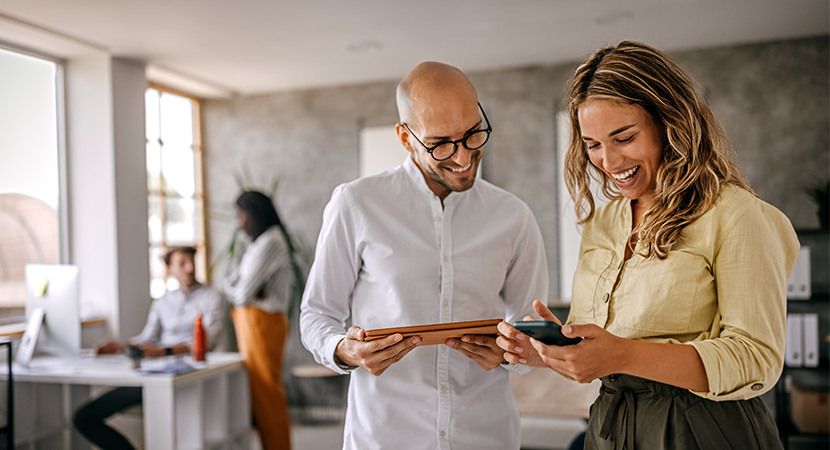associations manager working with a resident on their mobile devices